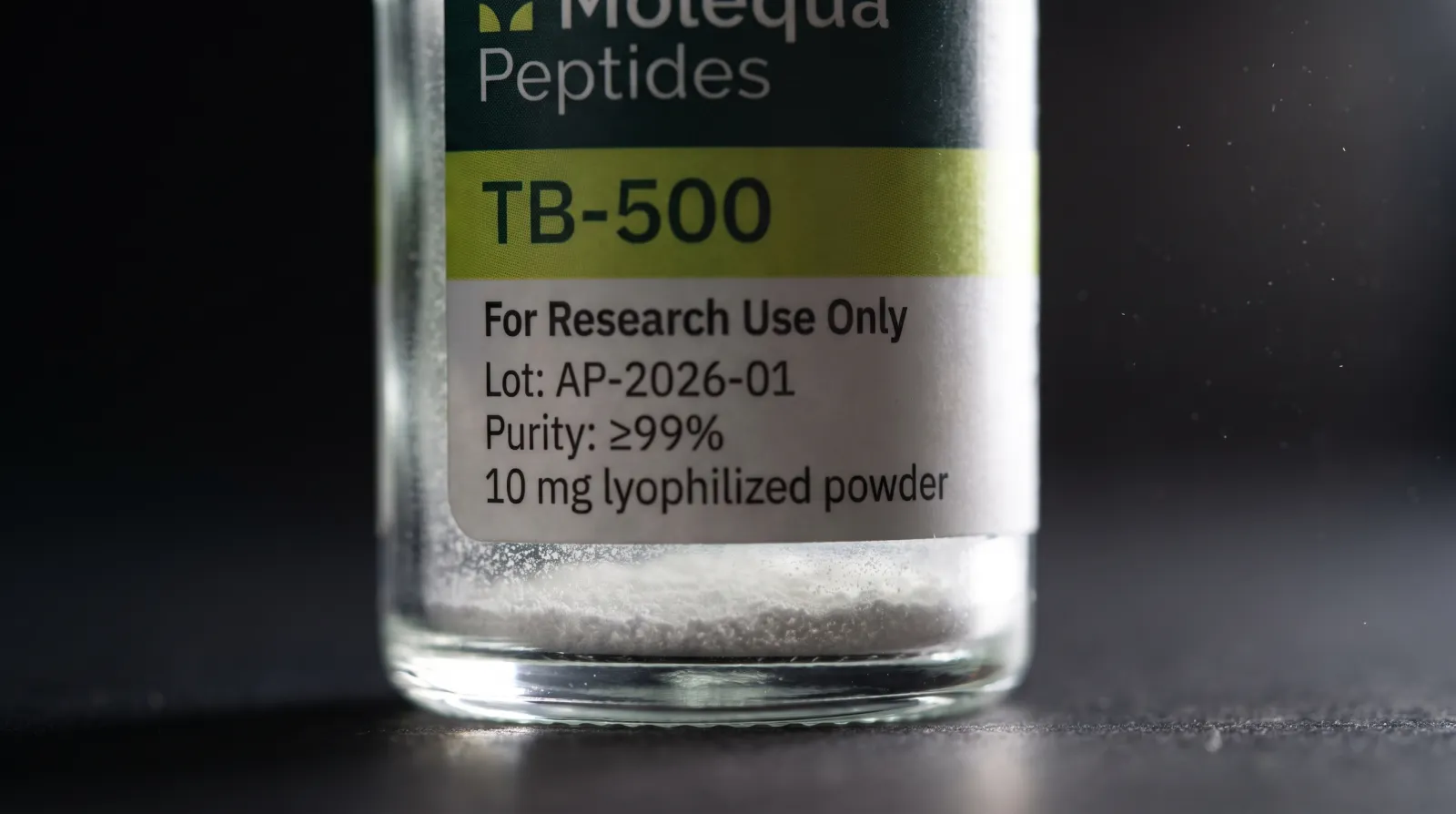 Macro detail of lyophilized powder settled at the bottom of a TB-500 research peptide vial